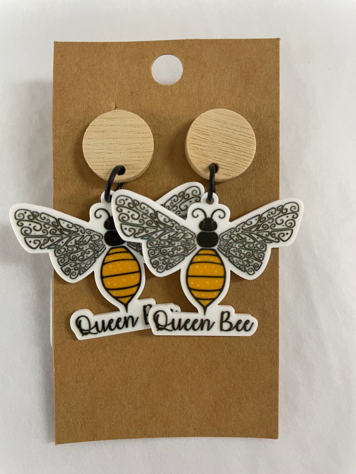 queen bee resin dangle earrings with natural timber stud tops by Beldari Pottery.