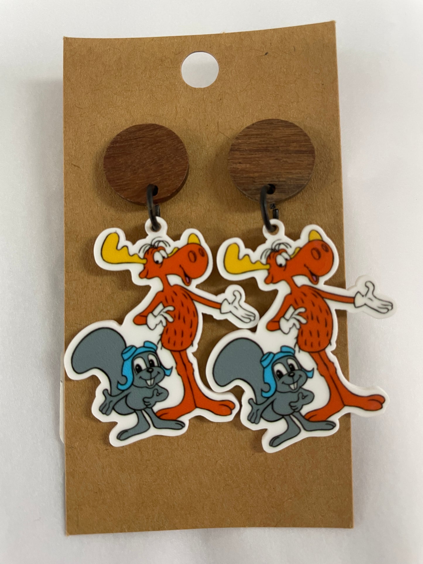 Rocky and Bullwinkle resin dangle earrings featuring Rocky and Bullwinkle with natural timber stud tops by Beldari Pottery.