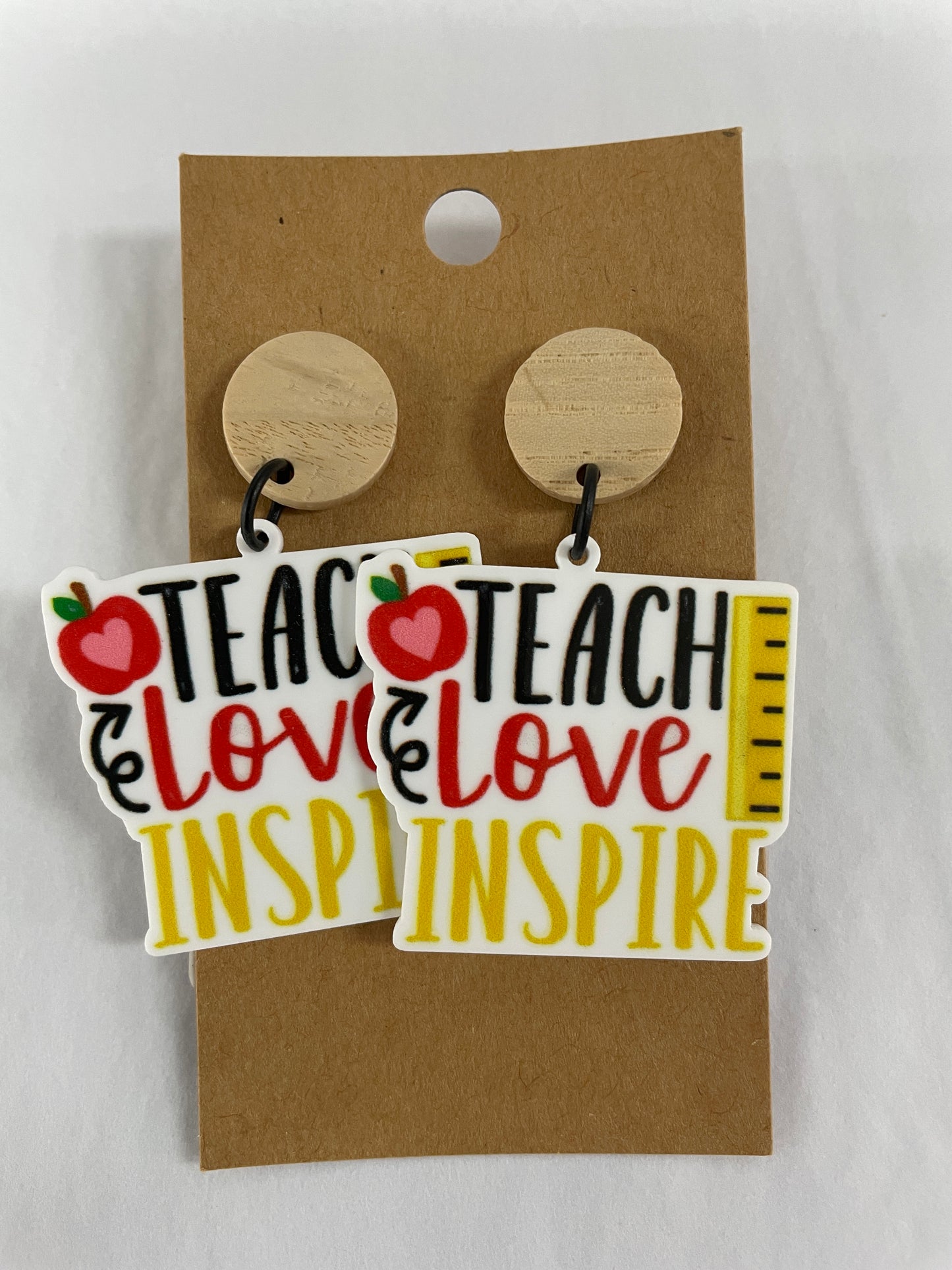 Teach Love Inspire teacher resin dangle earrings featuring apple and ruler designs with natural timber stud tops by Beldari Pottery.