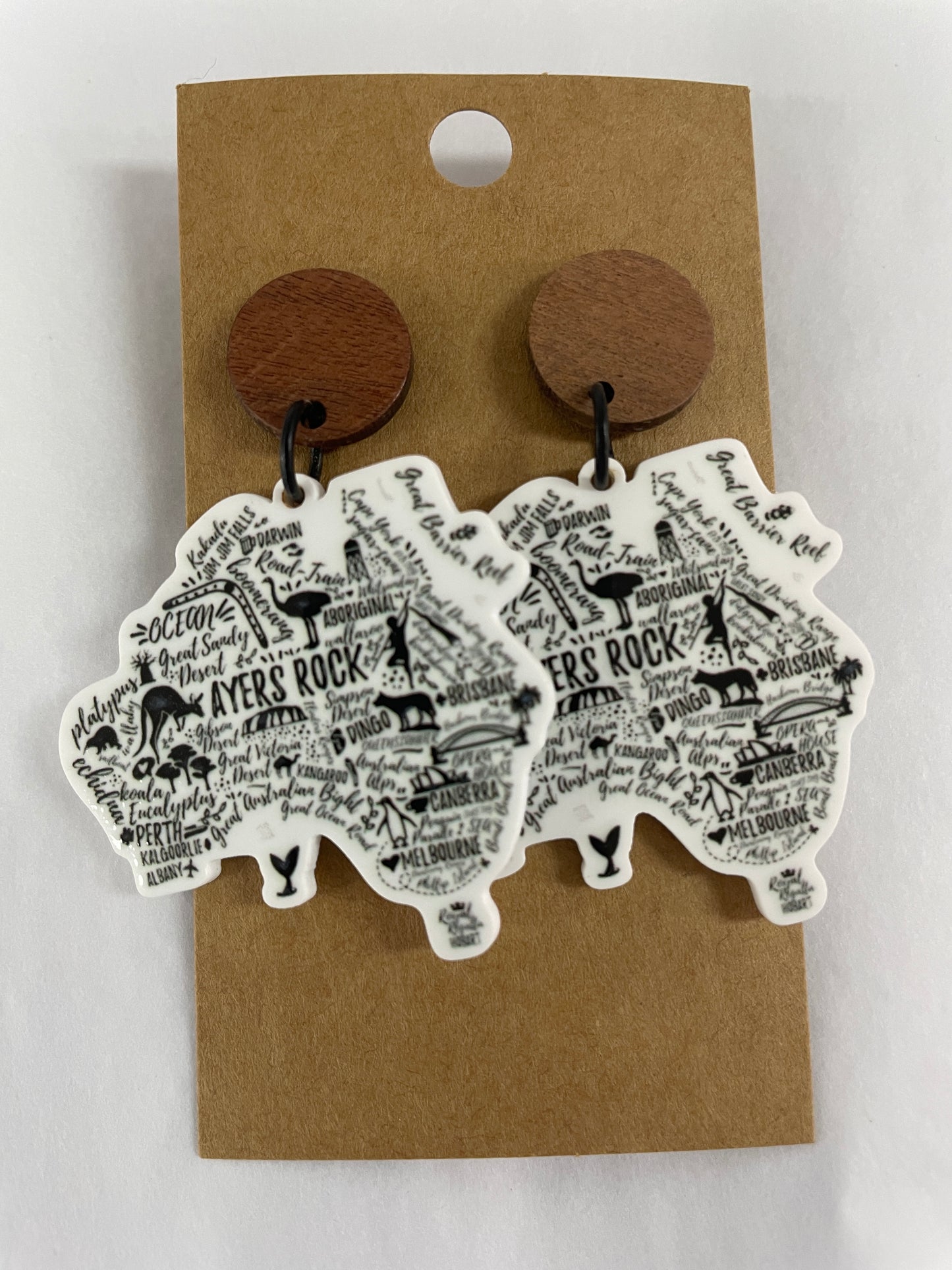 Australia map resin dangle earrings featuring Australian tourist destination names with natural timber stud tops by Beldari Pottery.