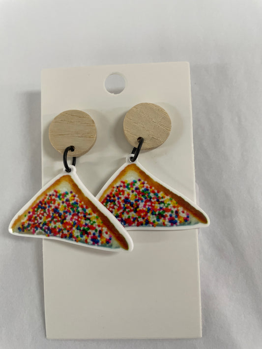 Horizontal fairy bread 100s and 1000s resin dangle earrings featuring one piece of fairy bread on each earring with natural timber stud tops by Beldari Pottery.