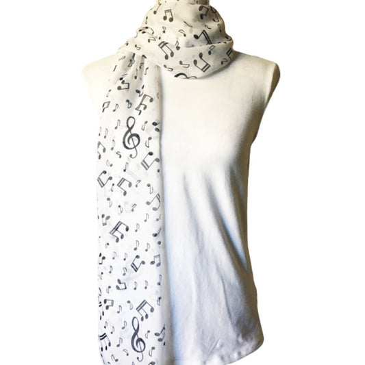 White lightweight scarf with black musical notes