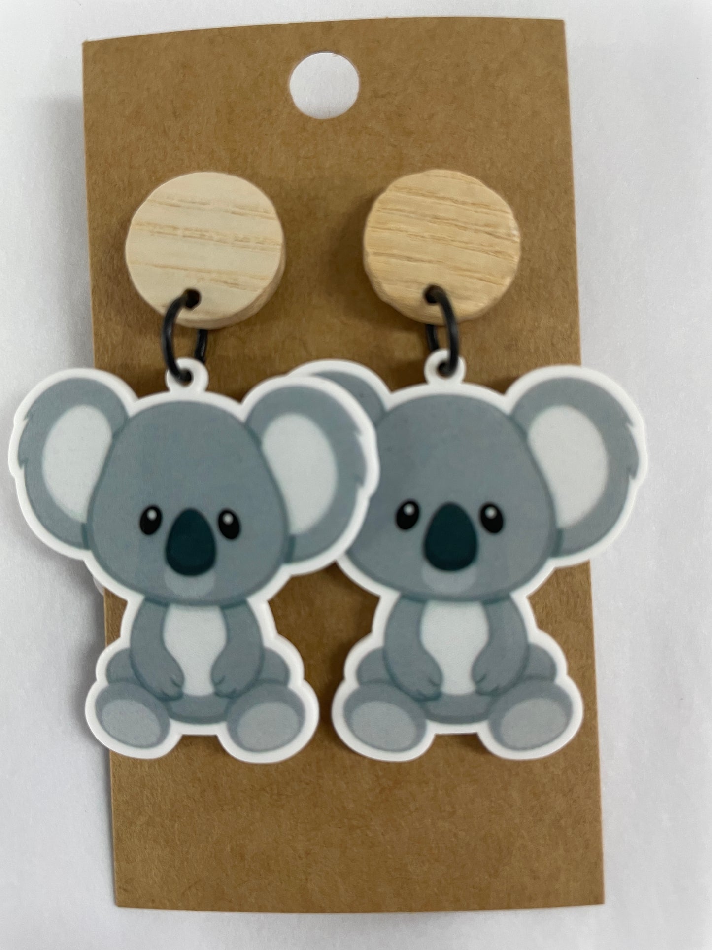 Beldari Pottery handmade koala resin dangle earrings with natural timber stud tops.