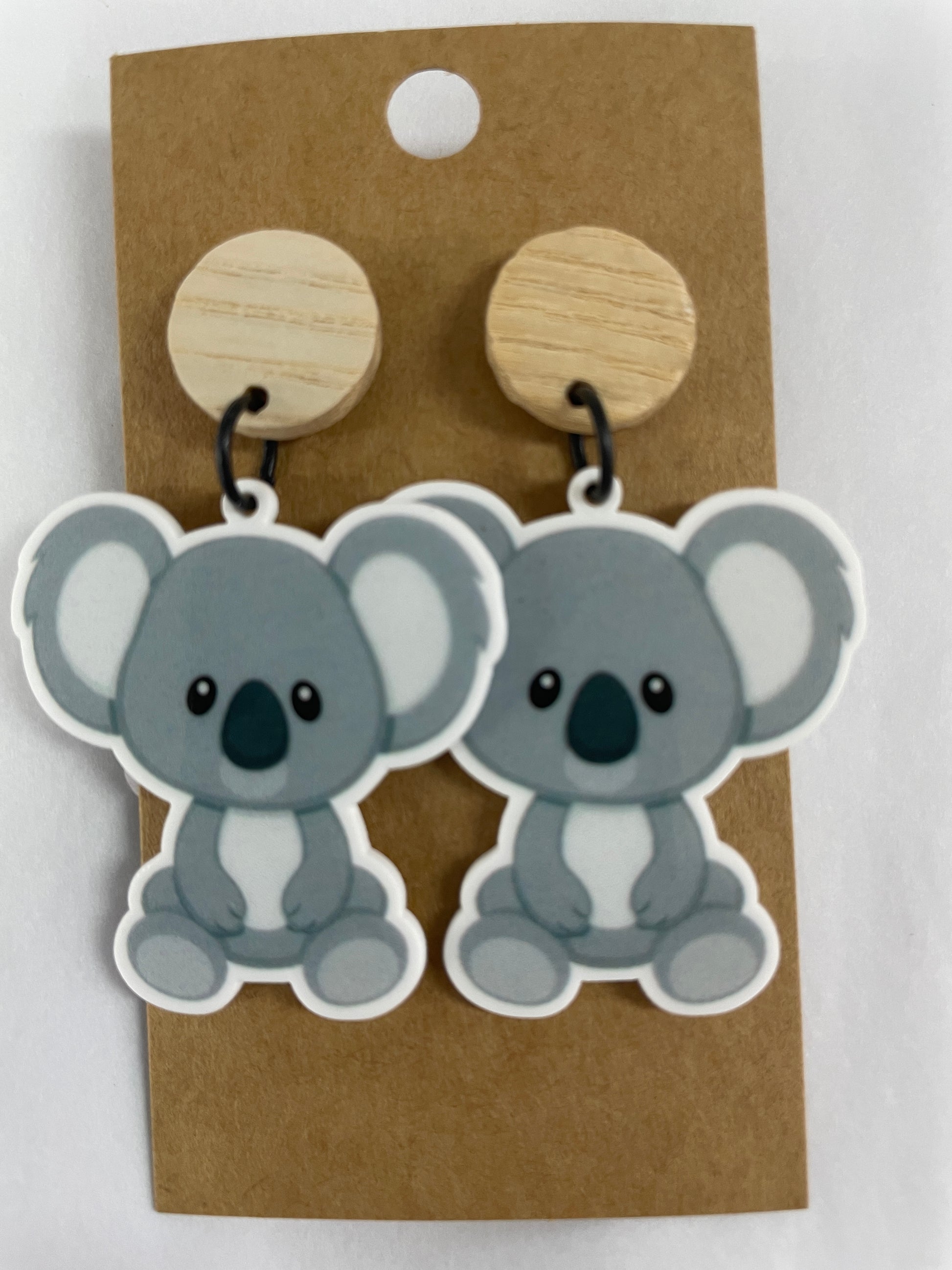 Beldari Pottery handmade koala resin dangle earrings with natural timber stud tops.