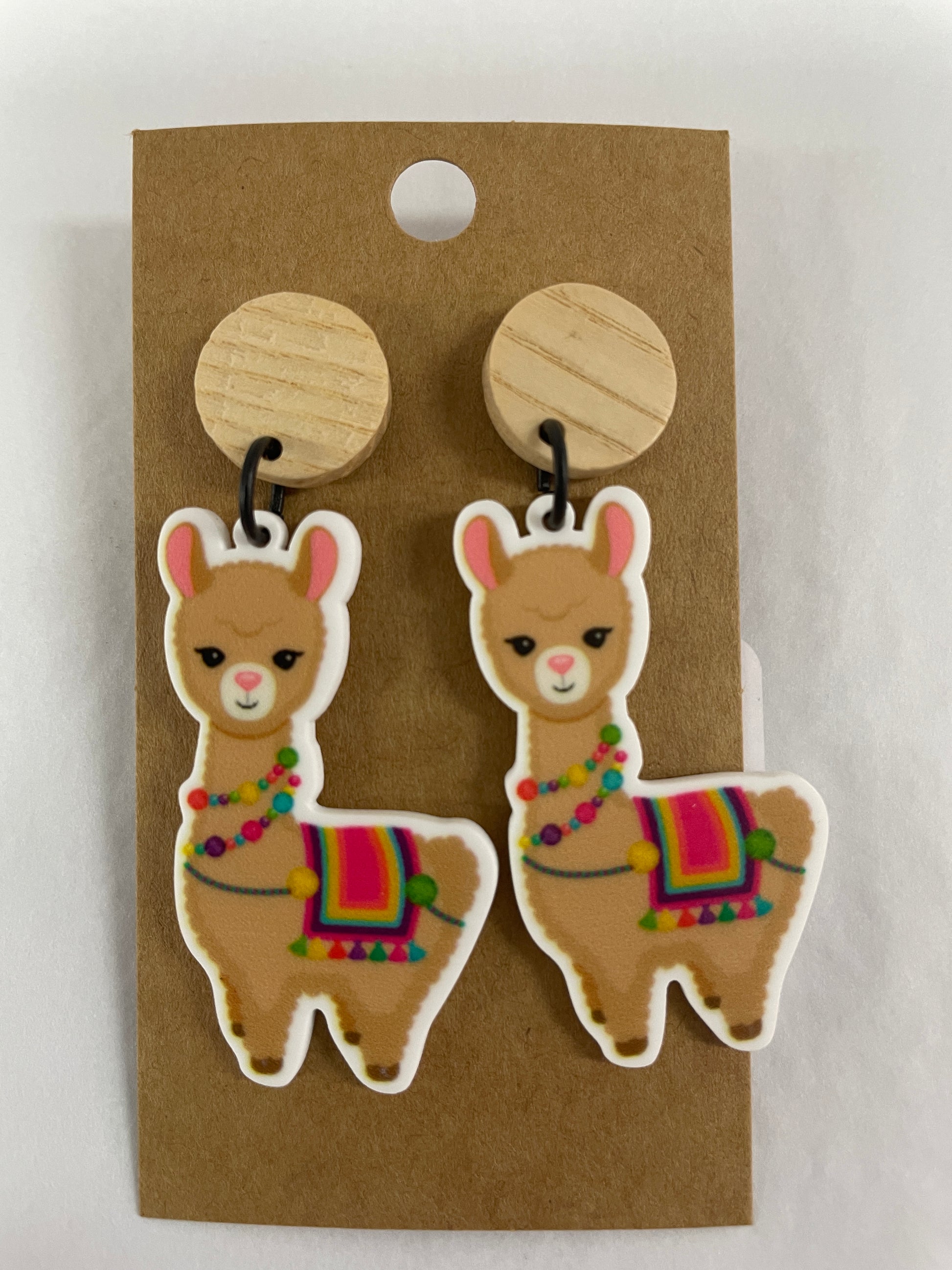 Llama resin dangle earrings featuring one llama on each earring with natural timber stud tops by Beldari Pottery.