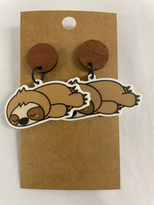 Sleeping sloth resin dangle earrings featuring one cute sloth on each earring with natural timber stud tops by Beldari Pottery.