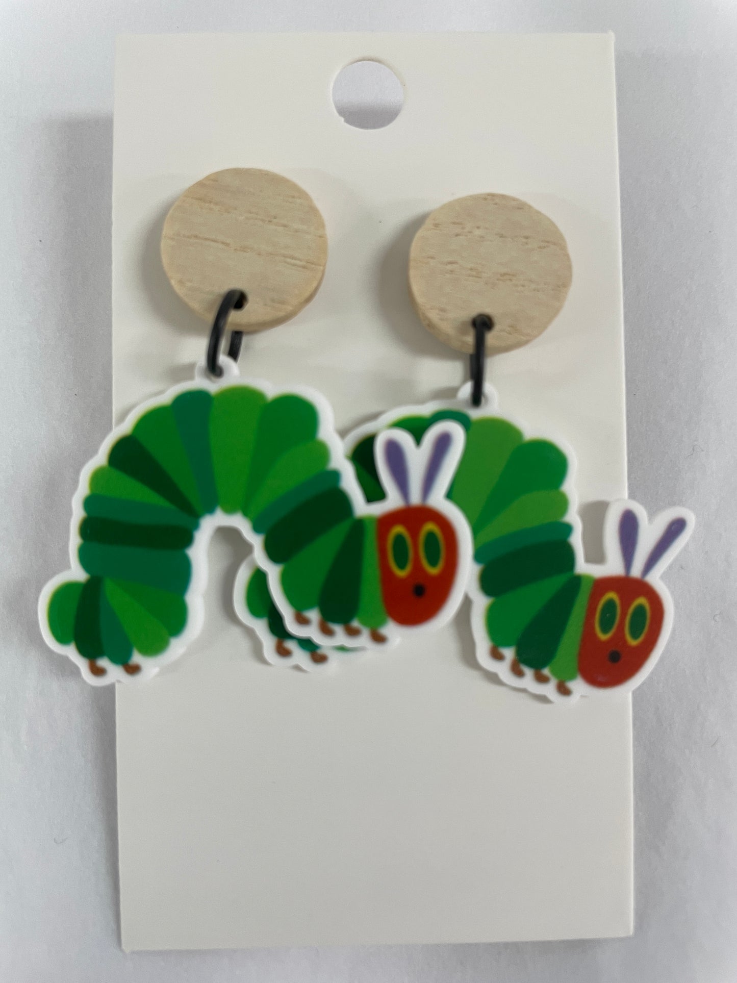 The Very Hungry Caterpillar resin dangle earrings featuring one colourful caterpillar on each earring with natural timber stud tops.