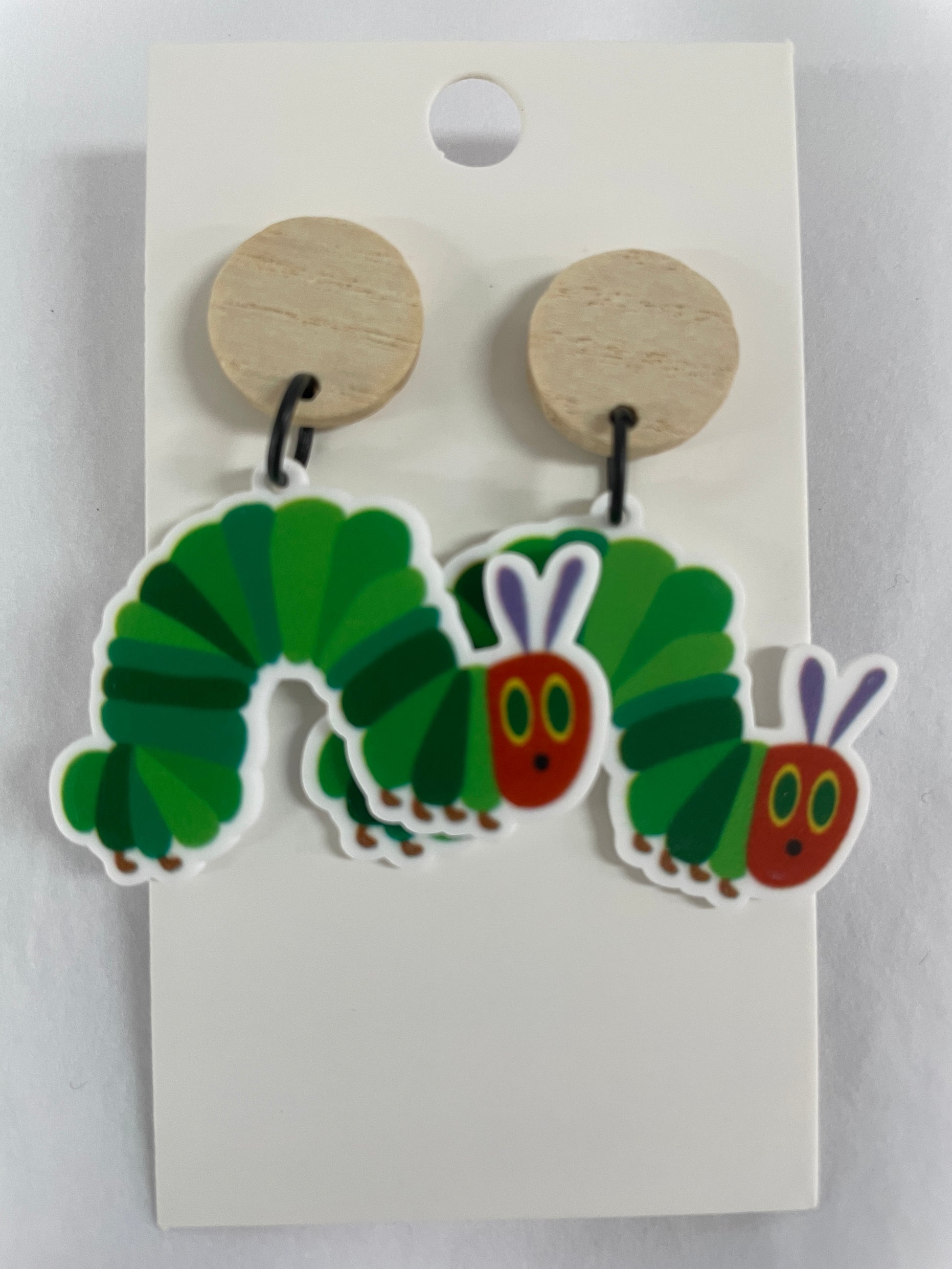 The Very Hungry Caterpillar resin dangle earrings featuring one colourful caterpillar on each earring with natural timber stud tops.